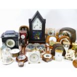 A collection of early 20th century and later mantel clocks, having manual and quartz movements,