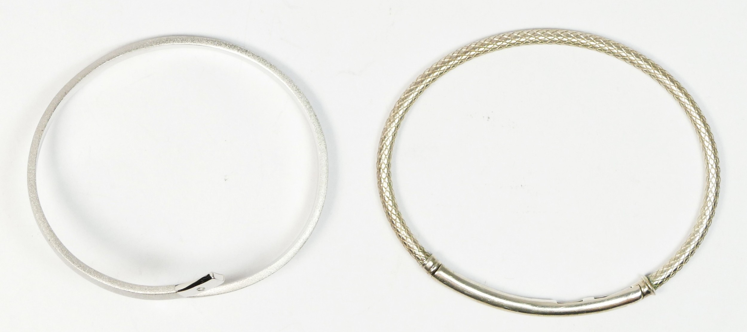 Chamilia, a silver snake skin bangle and a a 925 silver twist bangle, 28gm - Image 2 of 2