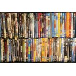 Three boxes of DVDs including films, box sets and documentaries, containing Friends, Ally McBeal,