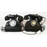 A pair of early 20th century telephones, black bakelite case converted to modern day use.