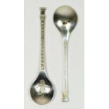 Peter Jackson for John Pinches, two silver Christmas spoons, signed, London 1976, with cast