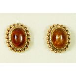 A pair of 9ct gold and amber ear studs, 11 x 9mm, 1.9gm