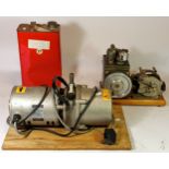 A two part high speed vacuum pump, AC240 single stage, model ISP20, with a 5 litre tin of associated