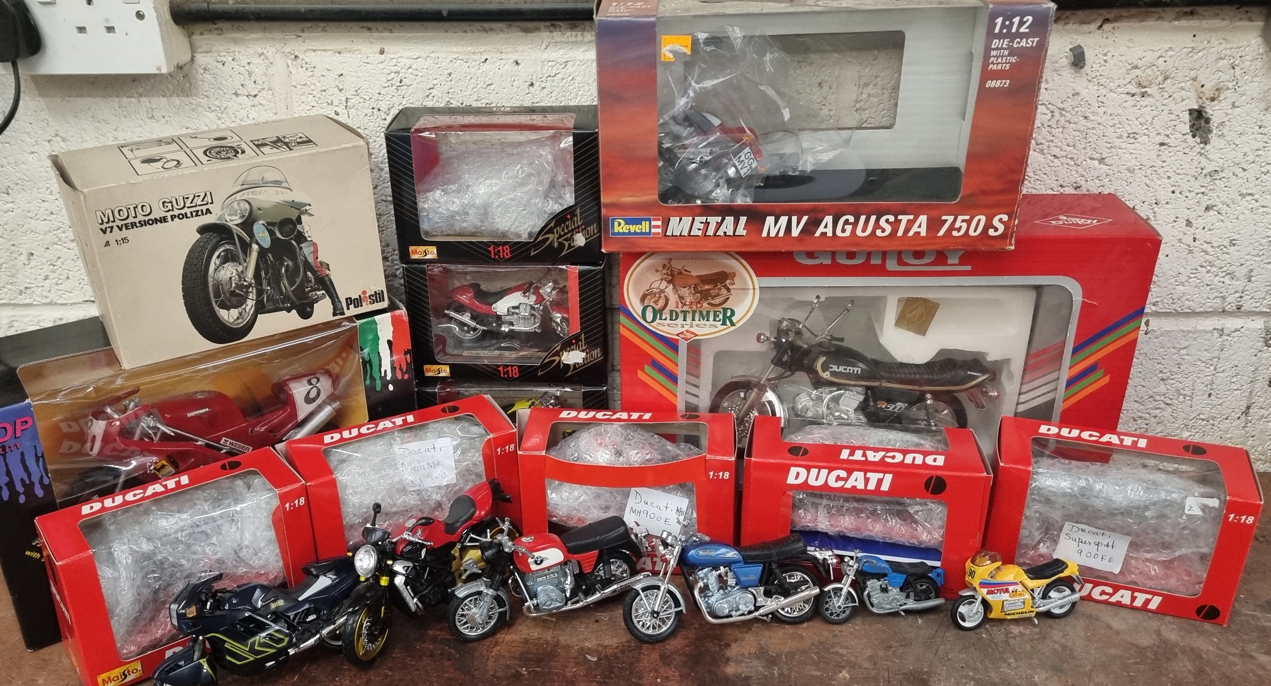 A collection of 5 x Maisto Ducati 1:18 models and other motorcycle models