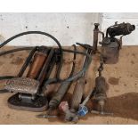 A Duplex Kismet Master foot pump, a Tecalemit brass grease gun, another pump, a blow lamp and a