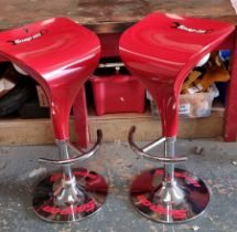A pair of Snap On adjustable bar stools