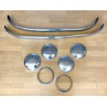 A selection of Austin A30 chromed trim, to include bumpers, hubcaps and headlight surrounds.