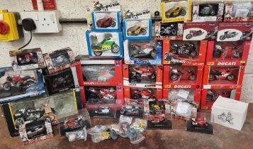 A collection of 6 x Maisto Ducati scale 1:18 models and other model motorcycles