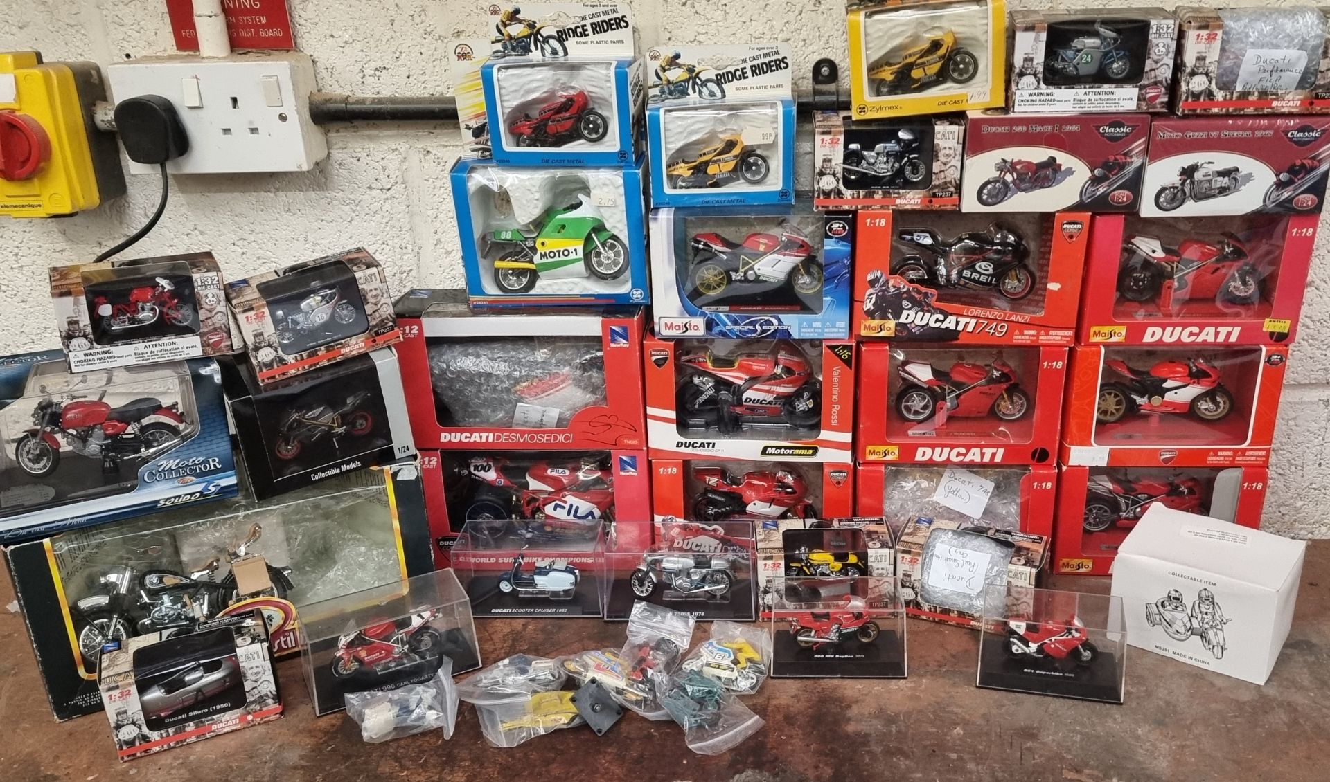 A collection of 6 x Maisto Ducati scale 1:18 models and other model motorcycles