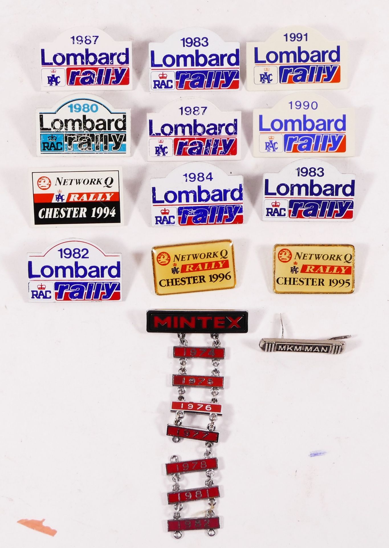 A collection of Lombard RAC Rally badges, c.1980 - 1991, Network Q badges, 1994 - 1996 and Mintex