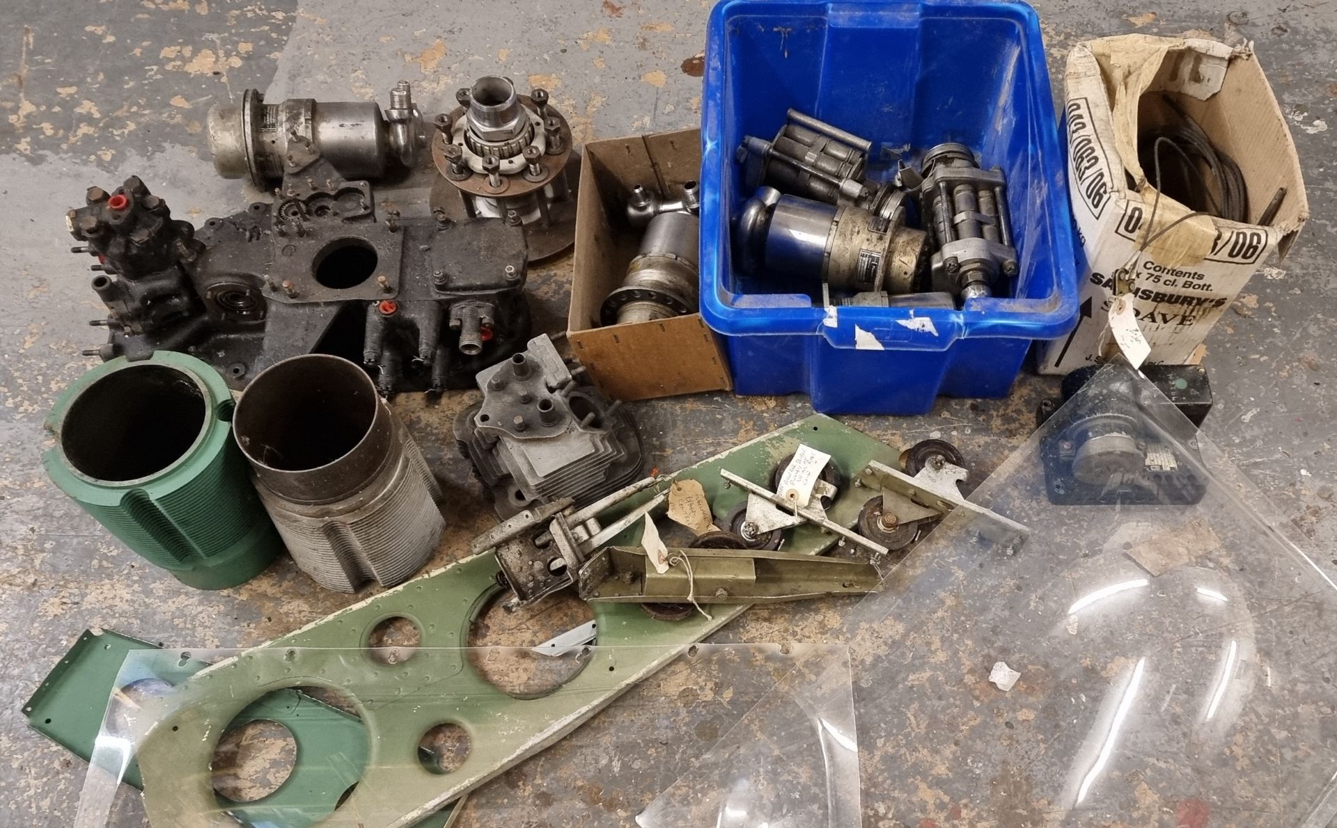 A collection of Chipmunk aeroplane parts, including ailerons pulleys, barrels and engine starters.