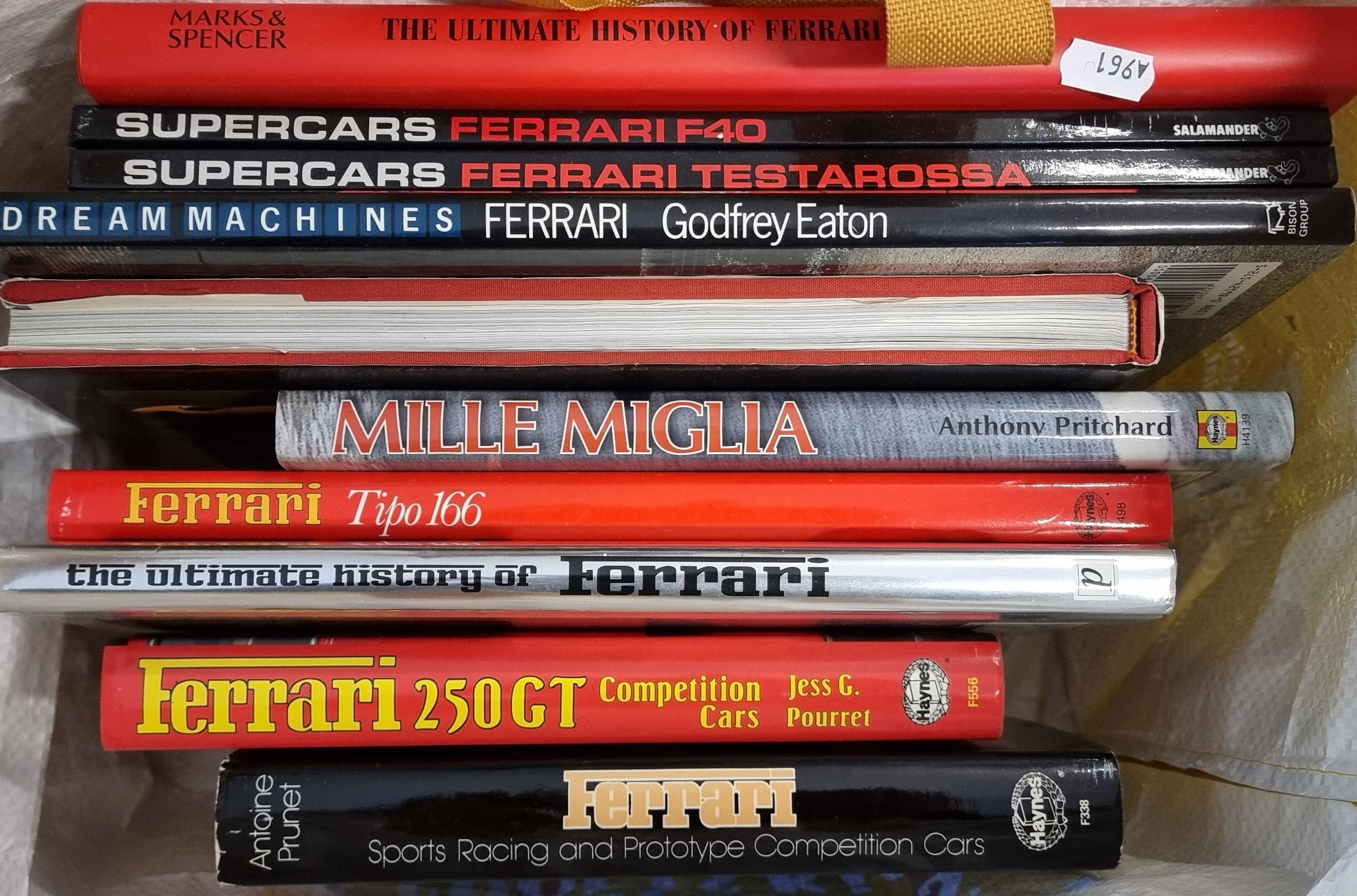 A collection of 19 books related to Ferrari including Ferrari Sports Racing and Protype Completion