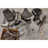 An autojumblers lot, to include a Lambretta Innocenti rear seat, and a prewar British seat