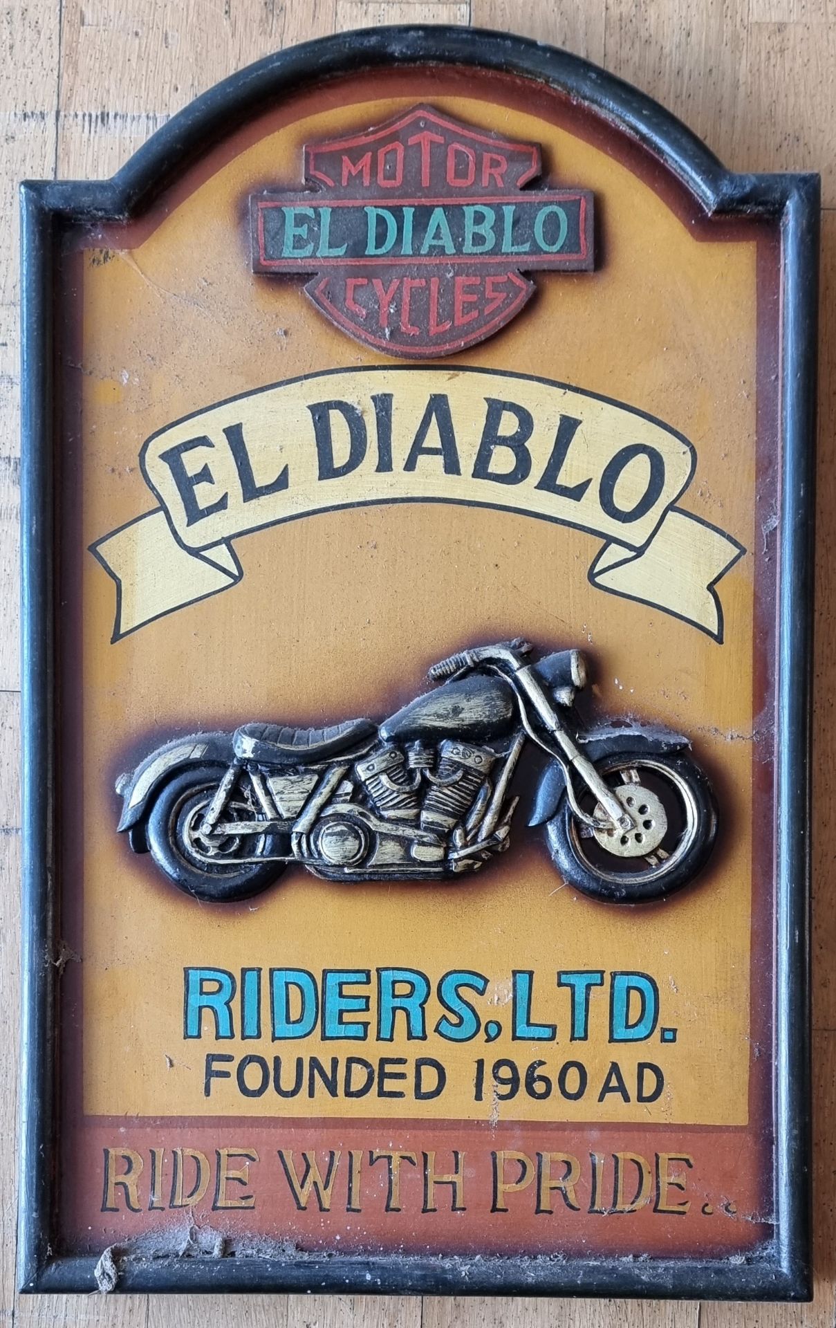 A El Diablo Motor Cycle hand painted relief wooden sign, 60 x 37cm.