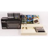 A Sinclair ZX Spectrum (serial No001-514922) with manuals and brochures, original box, together with