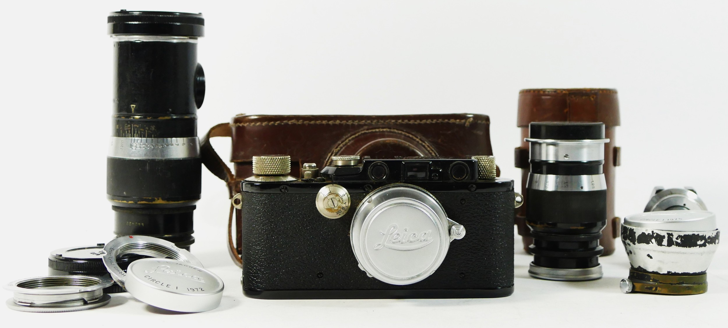 A Leica III D.R.P Ernst Leitz Wetzlar 35mm camera, black (serial No 185240), 1936, together with a