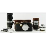 A Leica III D.R.P Ernst Leitz Wetzlar 35mm camera, black (serial No 185240), 1936, together with a