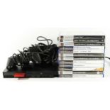 A Playstation 2 slim console (serial No FB7870027), with AV and power cables, 8MB memory card and