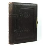 A Victorian tooled Herborita photograph album, with printed floral designs, 30 x 23 x 6cm