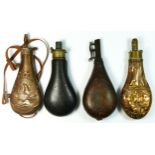 A copper and brass powder flask, unsigned, embossed body, 20cm, two leather examples and a