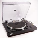 A Sansui SR-222MKII turntable with power and audio cables, also includes extra cartridges