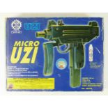 A Micro Uzi air soft gun, 1:1 scale, original box