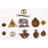 Three cap badges, 19th P.W.O. Hussars, Tank Corp, Queens Own Oxfordshire Hussars, two On War Service