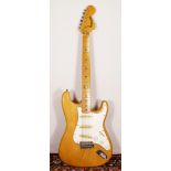 A Hohner electric guitar, Stratocaster style body, natural wood finish body, clear lacquered,