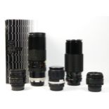 Five manual camera lens, to include a Hoya 75mm-260mm f4.5, Pentax fit, boxed, a Canon FD 70mm-210mm