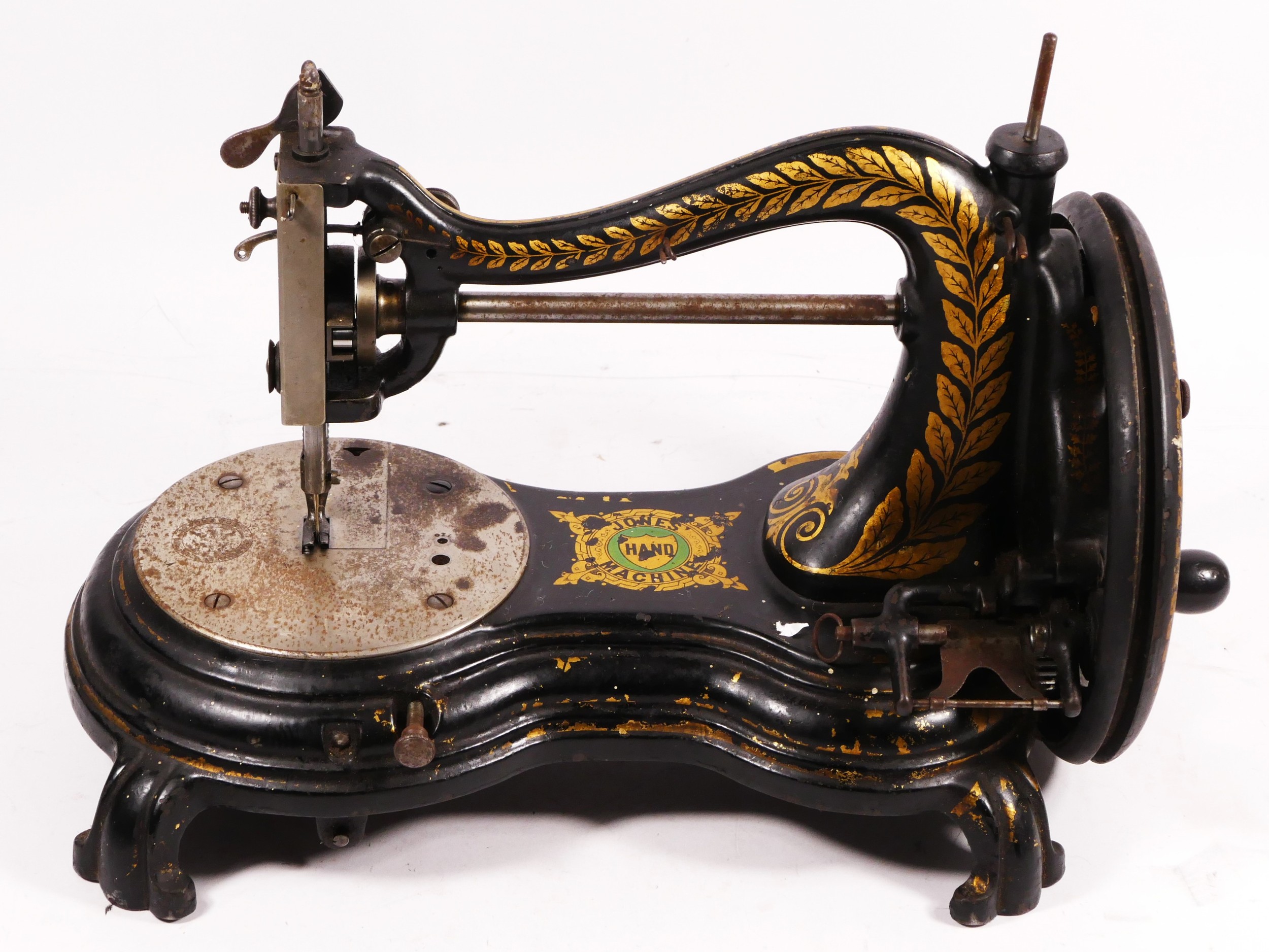 A Jones hand sewing machine, serpentine/cat back, with gilt floral decoration, 38cm long - Image 3 of 7