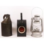 A oil can, stamped B.R., together with a E.T. road lamp and a hurricane lamp, complete with