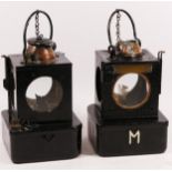 Two black B.R. (E) signal lamps, both with burners, one has missing window (2)