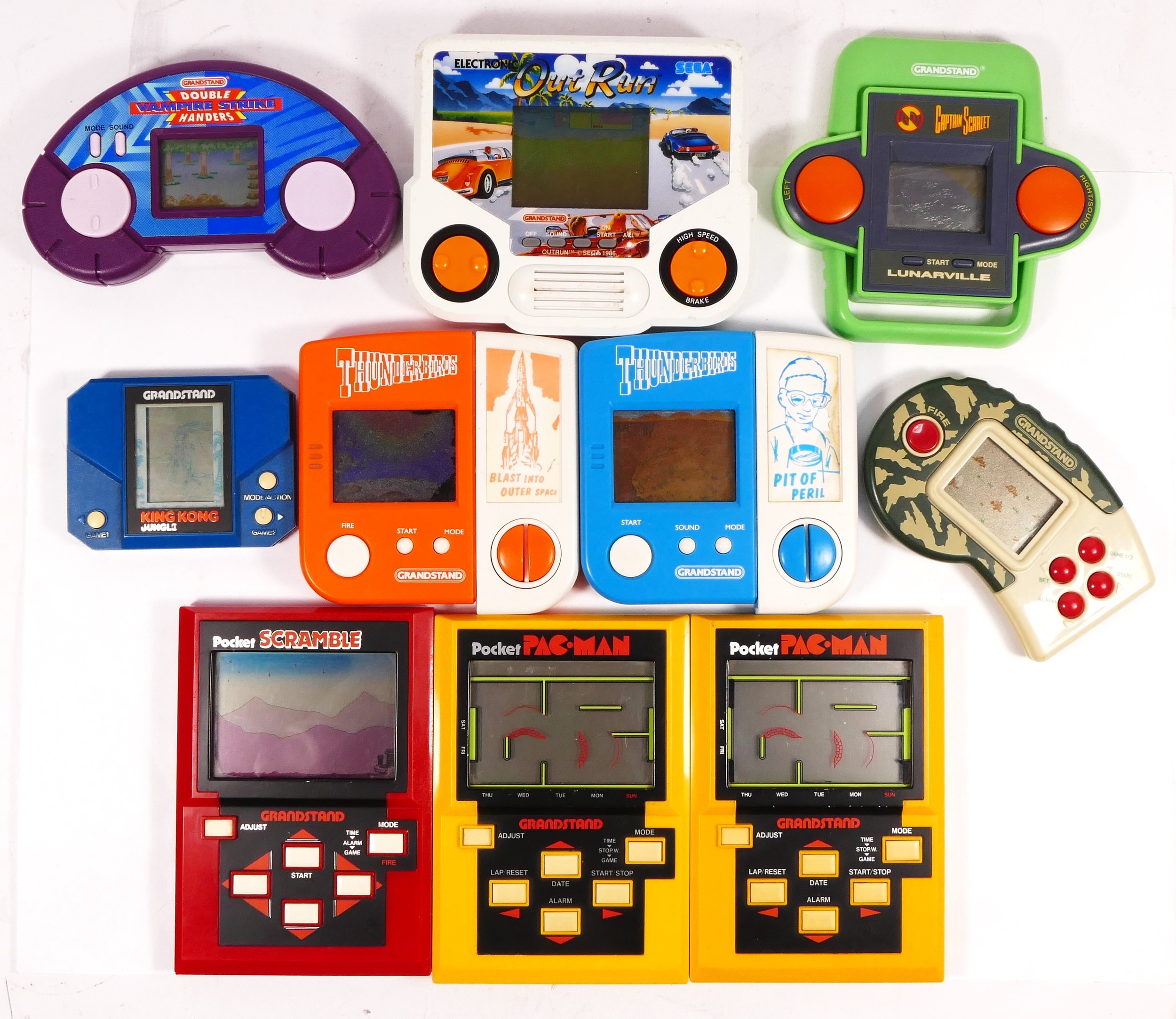 Ten electronic handheld games by Grandstand, to include Thunderbirds Blast Into Outer Space,