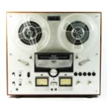 A Akai GX-265D stereo reel to reel, includes empty reels and manual