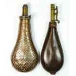 A copper and brass powder flask, by James Dixon, Sheffield, star embossed body, 20cm, together