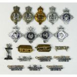 A collection of Edward VIII - Elizabeth H.M. Prison badges.