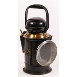 A Great Western Railway 3 aspect handlamp, body stamped G.W.R., complete with BR/WR burner