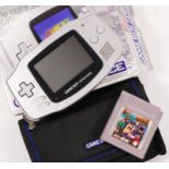 A Nintendo Game Boy Advance, in limited edition Platinum colourway, model No AGB-001 (serial No