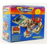 A Micro Machines Super City Toolbox, including bridge and airport stripe, original box