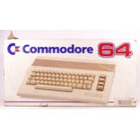 A Commodore 64 personal computer (serial No MB5 062320E), with power lead, original packaging