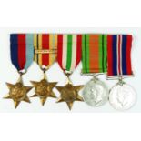 WWII mounted group of five, 1939-1945 Star, Africa Star with 8th Army bar, Italy Star, Defense and