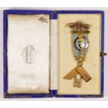 A 9ct gold and enamel Masonic jewel, Burlington Lodge, no. 3975, London 1933, 30.4gm, case