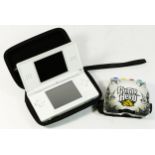 A Nintendo DS Lite (serial No UEH15567329), with three styluses, carry case and Guitar Hero On