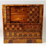 A Japanese Yosegi Zaiku marquetry jewellery cabinet, c1920s/30s, having five fitted drawers, two