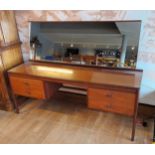 Austin Suite - Mid 20th century teak dressing table, raised on splayed legs with suspended body