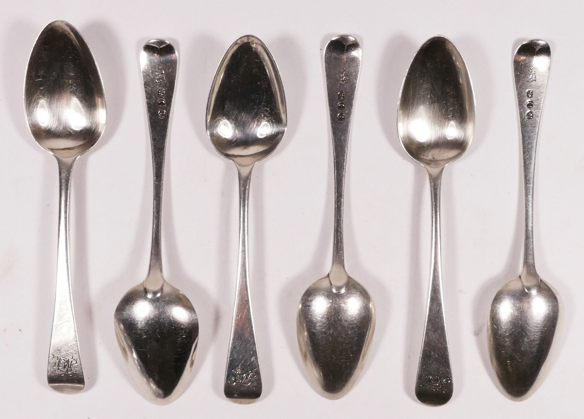 A George III silver set of Old English pattern tea spoons, London 1814, 112 gm