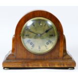 A mid 20th century oak cased mantel clock by Pearce & Sons of Leeds, having brass dial with Roman