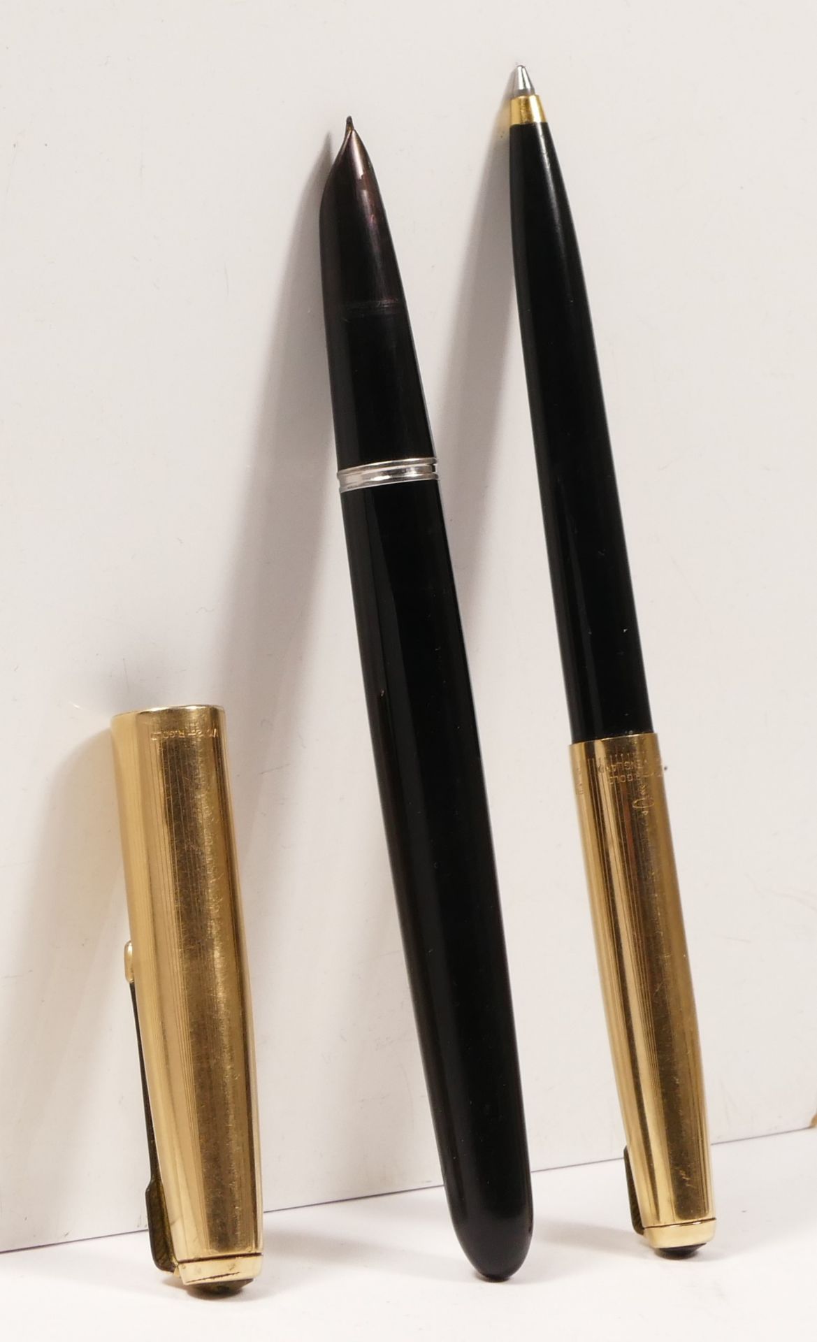 A cased Parker pen set, together with two silver dollar coins, a Silver Jubilee coin and two - Image 3 of 3