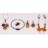 Six pieces of silver set amber jewellery, 41gm