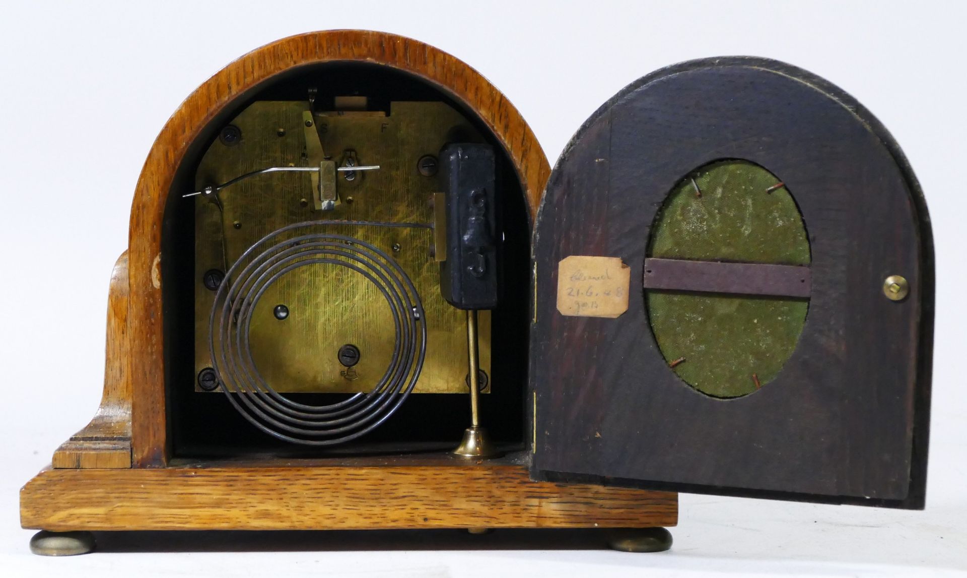 A mid 20th century oak cased mantel clock by Pearce & Sons of Leeds, having brass dial with Roman - Image 2 of 2